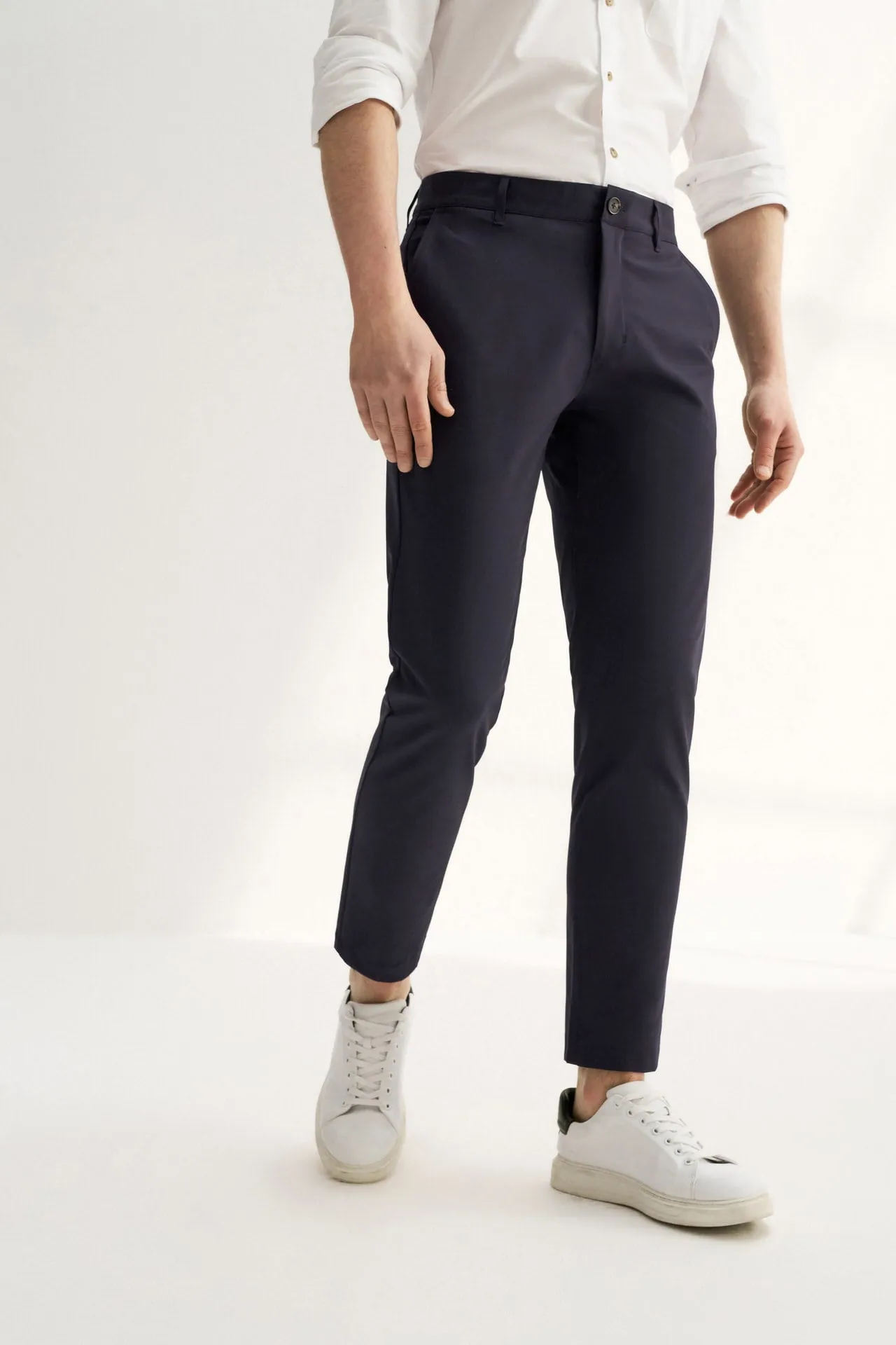 Compact Multi-Way Stretch Casual Pants in Slim Tapered Fit