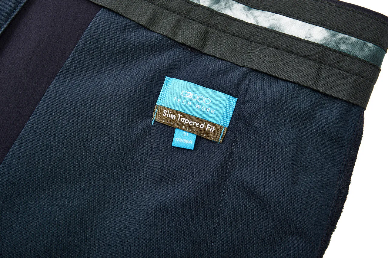 Compact Multi-Way Stretch Casual Pants in Slim Tapered Fit